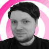 Rhys Wood headshot on a pink 'radar' background