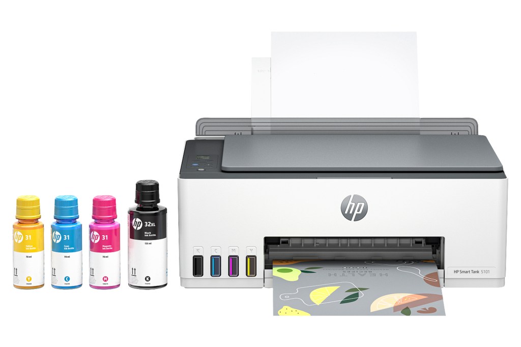 An HP Smart Tank 5101 printer with yellow, cyan, magenta, and black ink bottles.