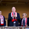 Prince Albert II of Monaco (C) and president of AS Monaco Dmitri Rybolovlev (L) attend the French L1 football match between AS Monaco and OGC Nice at the Stade Louis II in the Principality of Monaco on October 5, 2025. (Photo by Frederic DIDES / AFP) (Photo by FREDERIC DIDES/AFP via Getty Images)