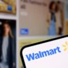 Illustration of the Walmart logo on a smartphone screen.