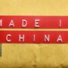 Red label reading MADE IN CHINA on brown packaging
