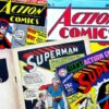 Assorted vintage Superman and Supergirl comic book covers.