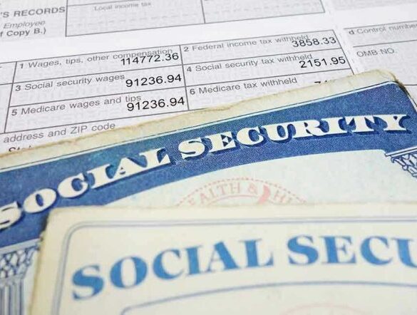 Social security cards on top of tax documents