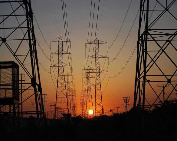 Transmission towers at sunset.