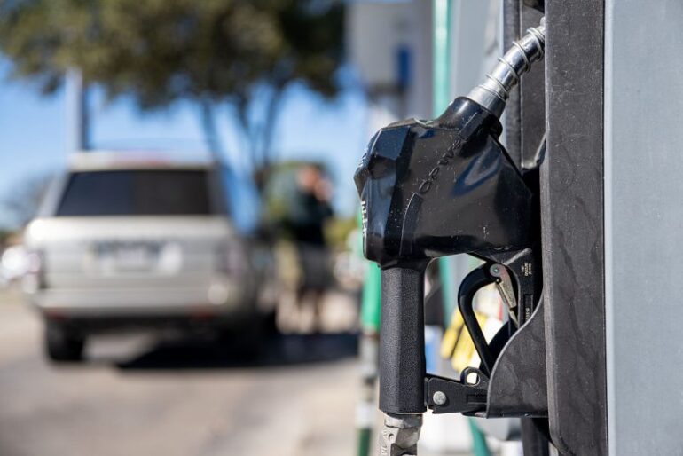 AUSTIN, TEXAS - NOVEMBER 26: A gas pump is seen on November 26, 2025 in Austin, Texas. Gas prices are near their lowest in four years, with twenty-eight states averaging prices below $3 a gallon. The decline is in part due to the steep drop in the cost of crude oil. (Photo by Brandon Bell/Getty Images)