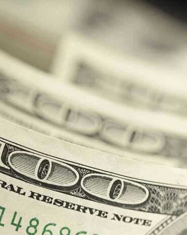 Close-up of hundred-dollar bills.