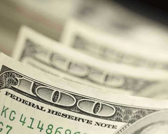 Close-up of hundred-dollar bills.