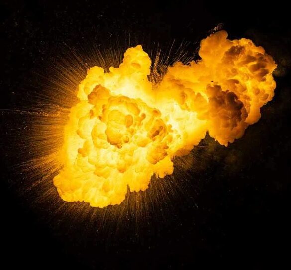 Bright, fiery explosion against a dark background.