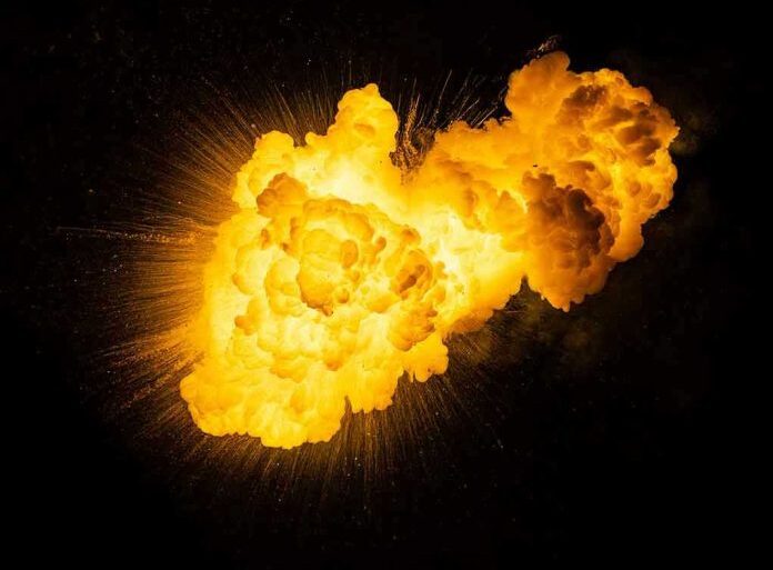 Bright, fiery explosion against a dark background.