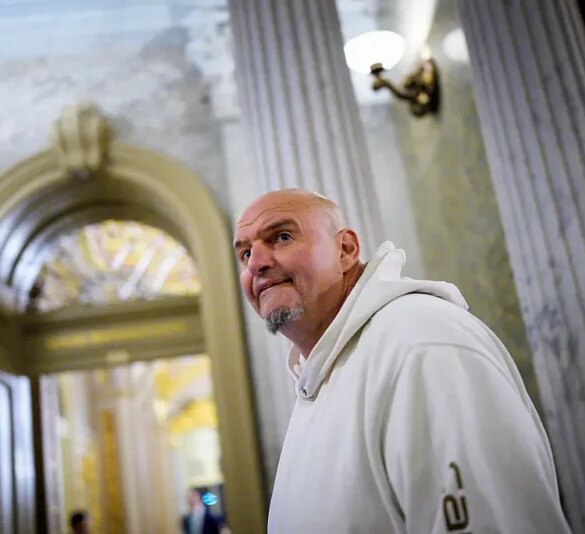 WASHINGTON, DC - NOVEMBER 10: U.S. Sen. John Fetterman (D-PA), one of eight Democrats to say he will vote with Republicans to open the government, arrives for votes on November 10, 2025 on Capitol Hill in Washington, DC. The Senate reached a deal late Sunday to fund the government, aiming to end the longest shutdown in history. (Photo by Andrew Harnik/Getty Images)