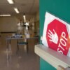 https://www.gettyimages.com/detail/news-photo/side-door-warns-visitors-to-stop-at-richneck-elementary-news-photo/1246066271?adppopup=true