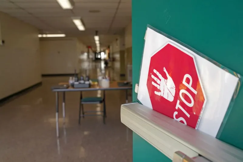 https://www.gettyimages.com/detail/news-photo/side-door-warns-visitors-to-stop-at-richneck-elementary-news-photo/1246066271?adppopup=true