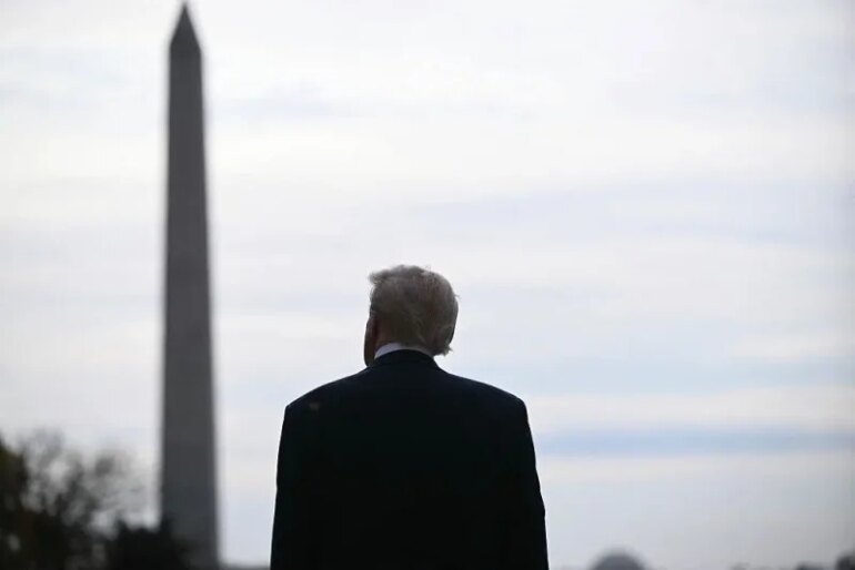 US President Donald Trump waits for the arrival of Crown Prince and Prime Minister of the Kingdom of Saudi Arabia Mohammed bin Salman on the South Lawn at the White House in Washington, DC on November 18, 2025. Saudi Crown Prince Mohammed bin Salman arrived at the White House to fanfare and a jet flyover Tuesday, in his first visit to the United States since the 2018 murder of journalist Jamal Khashoggi. (Photo by Brendan SMIALOWSKI / AFP) (Photo by BRENDAN SMIALOWSKI/AFP via Getty Images)