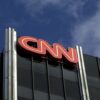 384757 02: The Cable News Network (CNN) logo adorns the top of CNN's offices on the Sunset Strip, January 24, 2000 in Hollywood, CA. CNN was hit with job cuts earlier this week after CNN's parent company, Time-Warner, Inc., completed its merger with America Online, Inc. (Photo by David McNew/Newsmakers)
