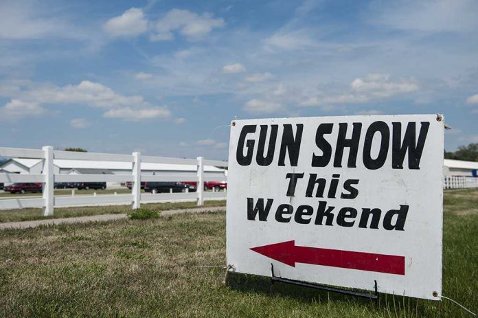 Sign advertising a gun show happening this weekend with an arrow pointing left