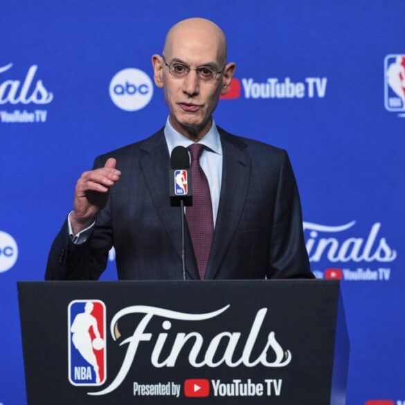 NBA Commissioner Adam Silver speaking at a press conference with "Finals Presented by YouTube TV" branding.