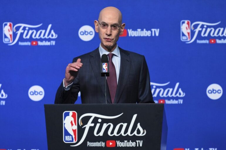 NBA Commissioner Adam Silver speaking at a press conference with "Finals Presented by YouTube TV" branding.