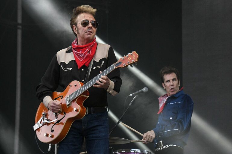 Brian Setzer (L) and Slim Jim Phantom, of the Stray Cats, perform on stage during the 31st Eurockeennes rock music festival in Belfort, eastern France, on July 7, 2019.