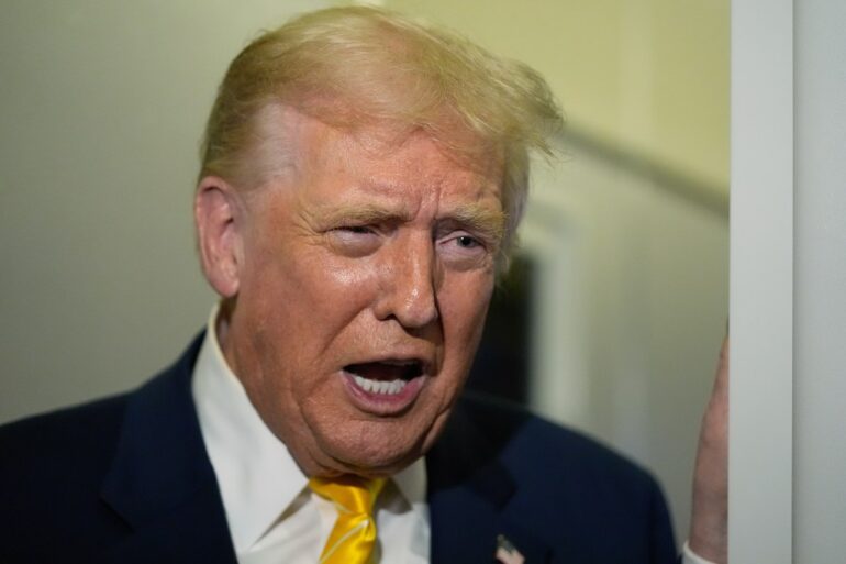 President Donald Trump speaking to reporters on Air Force One.