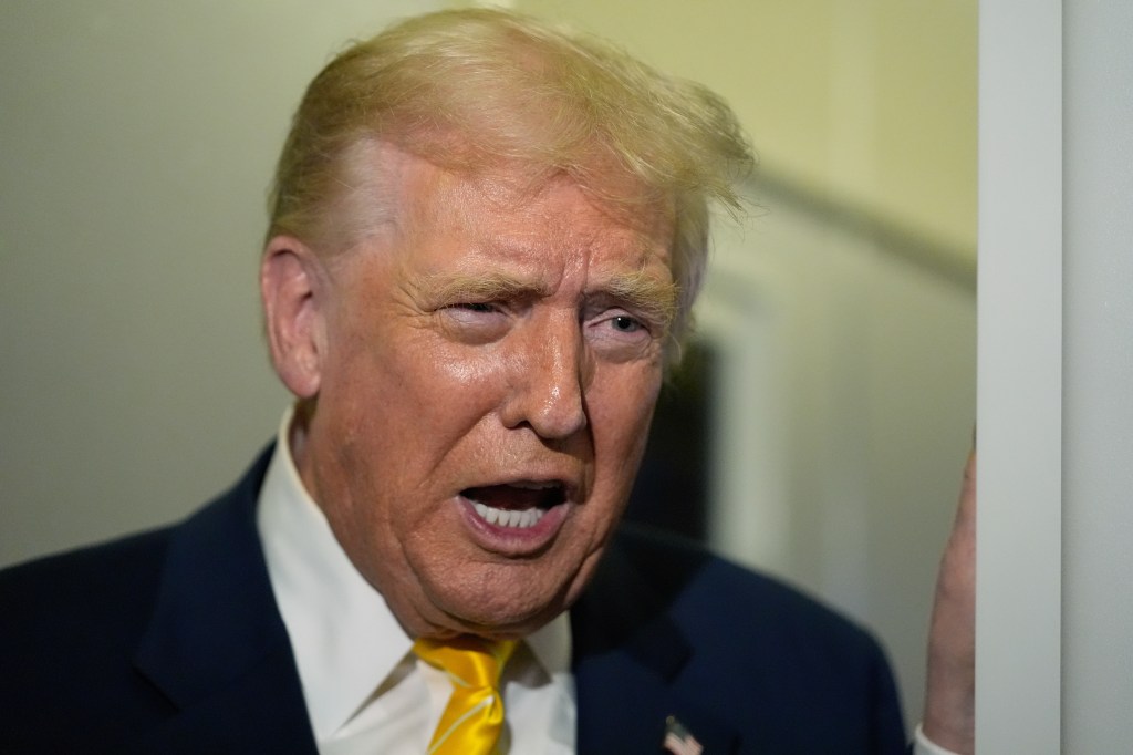 President Donald Trump speaking to reporters on Air Force One.