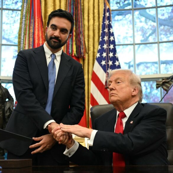 Donald Trump shaking hands with Zohran Mamdani in the Oval Office.