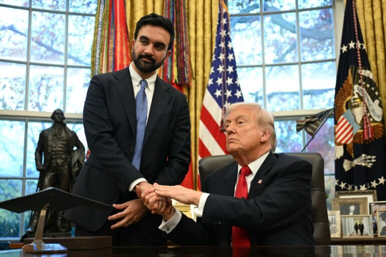 Donald Trump shaking hands with Zohran Mamdani in the Oval Office.