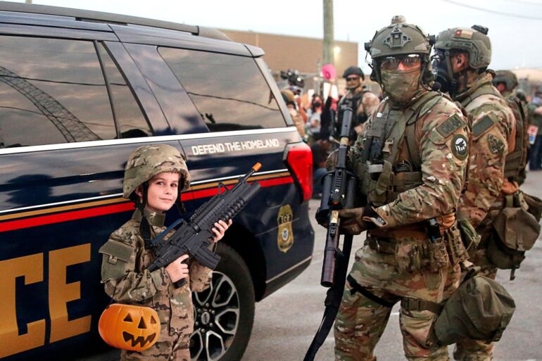 Satire news: ice agent, 7 year old both wearing same ‘military commando’