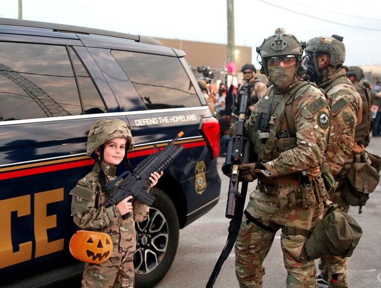 Satire news: ice agent, 7 year old both wearing same ‘military commando’