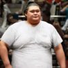 Satire news: self conscious sumo wrestler wears white t shirt into ring