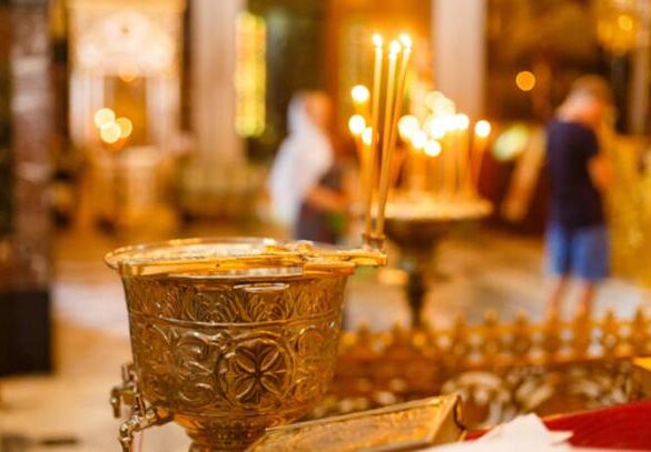 Chalice for olive oil in a religious setting.