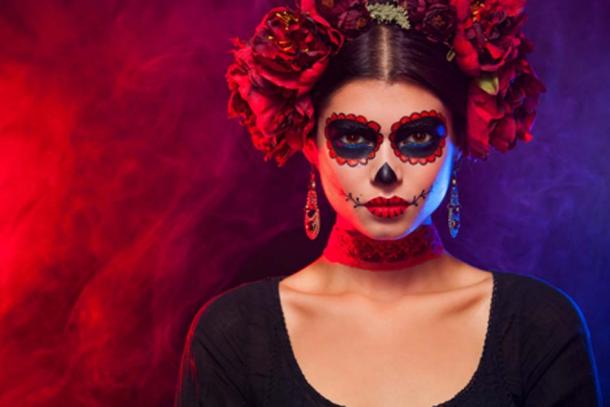 Lady dressed up as La Catrina for Dia de los Muertos.