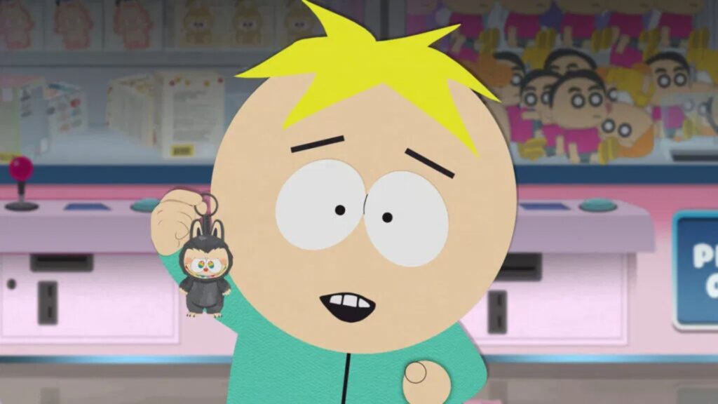 Butters holds a Labubu keyring