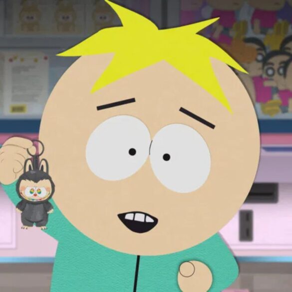 Butters holds a Labubu keyring