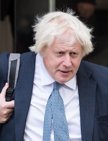 Former British Prime Minister Boris Johnson leaves Dorland House after giving evidence to the COVID inquiry in London on Oct. 21, 2025.