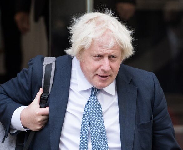 Former British Prime Minister Boris Johnson leaves Dorland House after giving evidence to the COVID inquiry in London on Oct. 21, 2025.