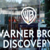 The logo of Warner Bros. Discovery is seen at one of their offices in Culver City, California, on December 5, 2025. (Photo by Patrick T. Fallon / AFP via Getty Images)