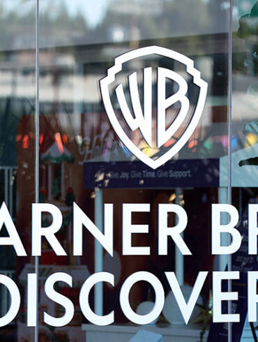 The logo of Warner Bros. Discovery is seen at one of their offices in Culver City, California, on December 5, 2025. (Photo by Patrick T. Fallon / AFP via Getty Images)