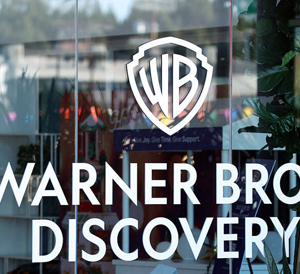 The logo of Warner Bros. Discovery is seen at one of their offices in Culver City, California, on December 5, 2025. (Photo by Patrick T. Fallon / AFP via Getty Images)