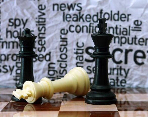 Chess pieces with secretive background text pattern