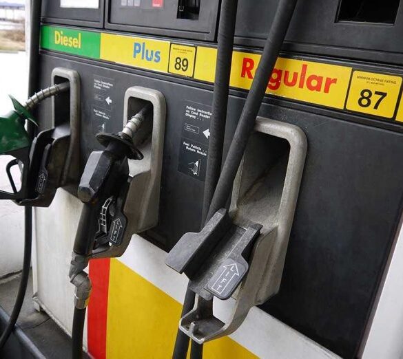 Gas station pumps for diesel, plus, and regular fuel.