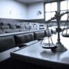 Scales of justice in an empty courtroom.