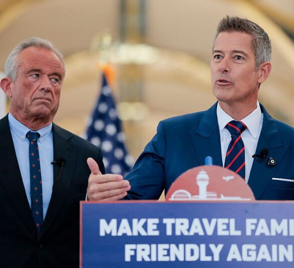 ARLINGTON, VA - DECEMBER 08: U.S. Transportation Secretary Sean P. Duffy (R) speaks alongside Human Services Secretary Robert F. Kennedy Jr. at a conference discussing the launch of the "Make Travel Family Friendly Again" campaign at Ronald Reagan Washington National Airport on December 08, 2025 in Arlington, Virginia. The campaign's focus is to incentivize family-friendly resources at airports. (Photo by Heather Diehl/Getty Images)