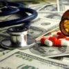 Stethoscope and prescription pills on a background of dollar bills