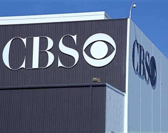 Exterior view of a CBS media building featuring the CBS logo