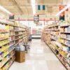 A grocery store aisle filled with various food products on shelves