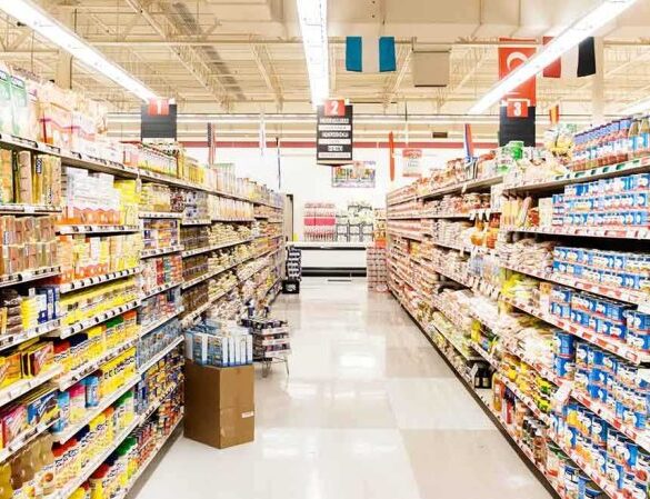A grocery store aisle filled with various food products on shelves