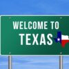 Welcome to Texas road sign with a Texas map