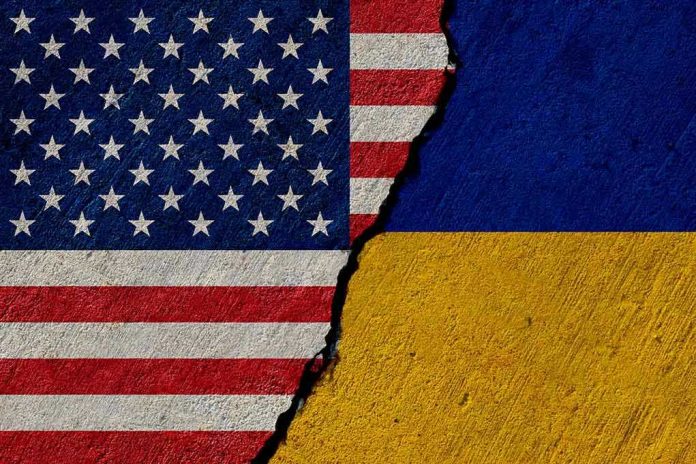 Torn United States and Ukraine flags.