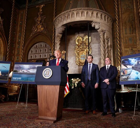 PALM BEACH, FLORIDA - DECEMBER 22: U.S. President Donald Trump, joined by Secretary of State Marco Rubio (L), Secretary of War Pete Hegseth, and Secretary of the Navy John Phelan, announced the creation of the “Trump-class” battleship during a statement to the media at Trump’s Mar-a-Lago estate on December 22, 2025 in Palm Beach, Florida. Trump announced the new class of ship will become the centerpiece of his “Golden Fleet” program to rebuild and strengthen the U.S. shipbuilding industry. (Photo by Tasos Katopodis/Getty Images)