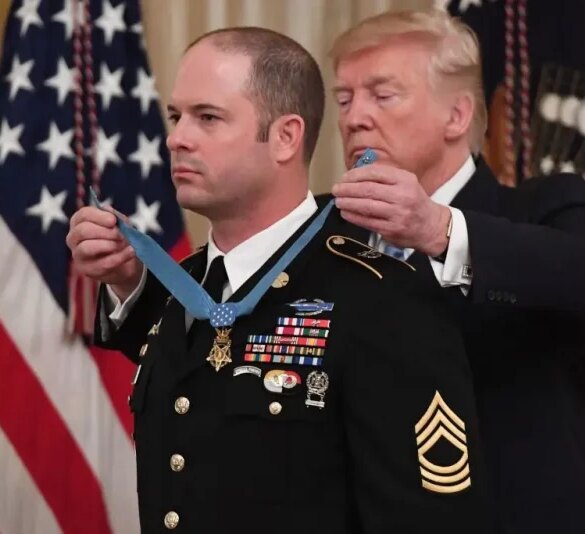 US President Donald Trump presents the Medal of Honor to US Army Master Sergeant Matthew Williams for actions in 2008 in Afghanistan, during a ceremony in the East Room of the White House in Washington, DC, October 30, 2019. (Photo by SAUL LOEB / AFP) (Photo by SAUL LOEB/AFP via Getty Images)